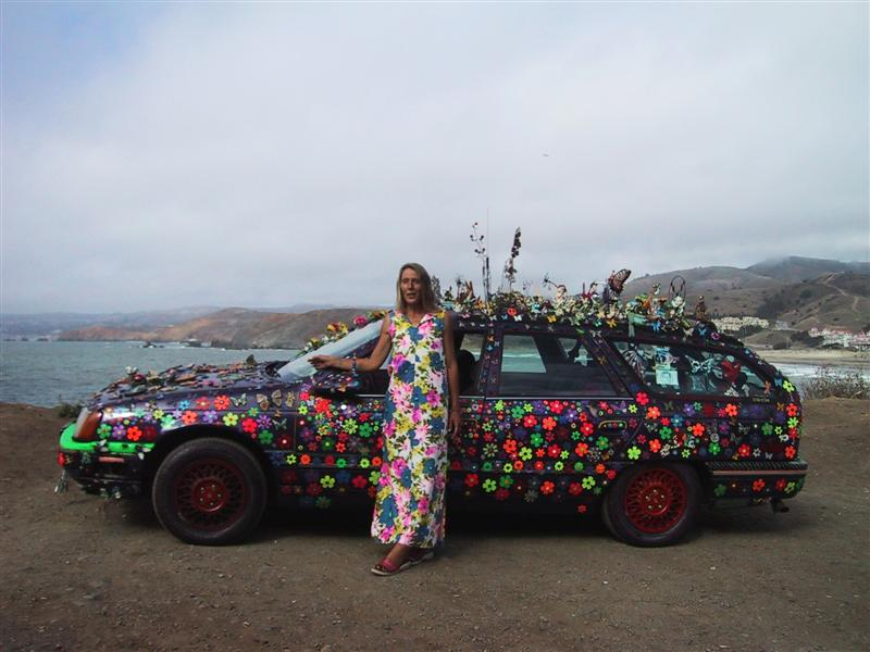 Illustration for article titled Groovalicious Purple Princess Of Peace Art Car Falls On Hard Times, Faces Crusher
